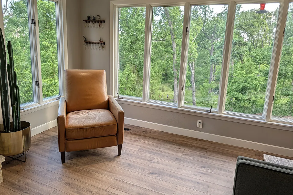 Trim installation in Cedar Rapids living room with natural light