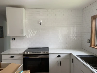 Kitchen backsplash tile work — Cedar Rapids, IA Kitchen backsplash tile installation in Cedar Rapids home