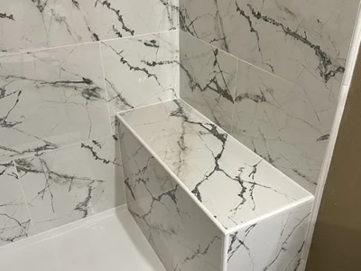 Marble tile work in Cedar Rapids, IA White marble tile installation by Cedar Rapids Flooring and Remodel