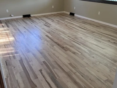 Light hardwood flooring installed by Cedar Rapids Flooring & Remodel Light hardwood floor installation in Cedar Rapids, IA