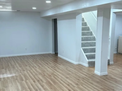Stair flooring completed by Cedar Rapids Flooring & Remodel Staircase flooring installation in Cedar Rapids home