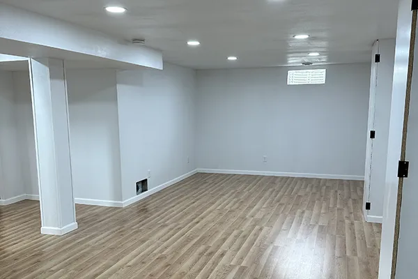Luxury vinyl plank flooring installed in bright Cedar Rapids room