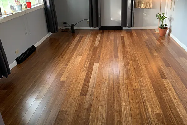Dark hardwood floor installation in Cedar Rapids home