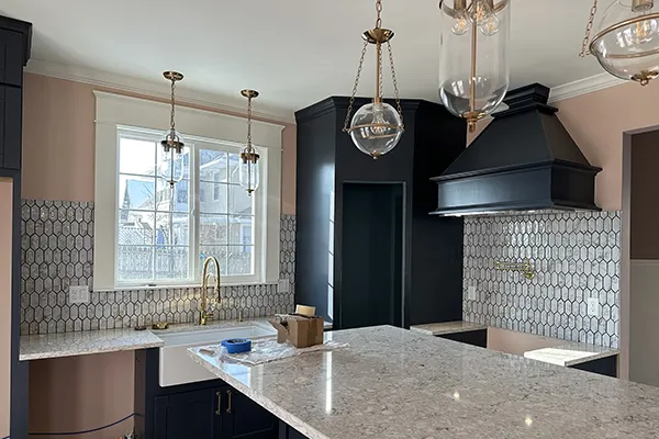 Kitchen remodel with hardwood floors and dark cabinets in Cedar Rapids